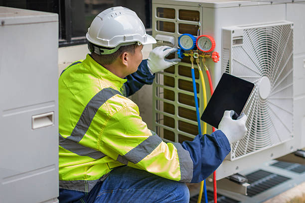 Professional Hvac technician working in Newton Lower Falls, MA